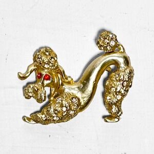 VTG 60s Gold Tone Rhinestone Playful Poodle Brooch Red Eyes Dog Pin